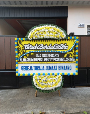 Papan Bunga Duka di Aek Parombunan